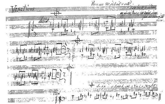 A faded sheet of sheet music, written in a strange looking and difficult to make out notation